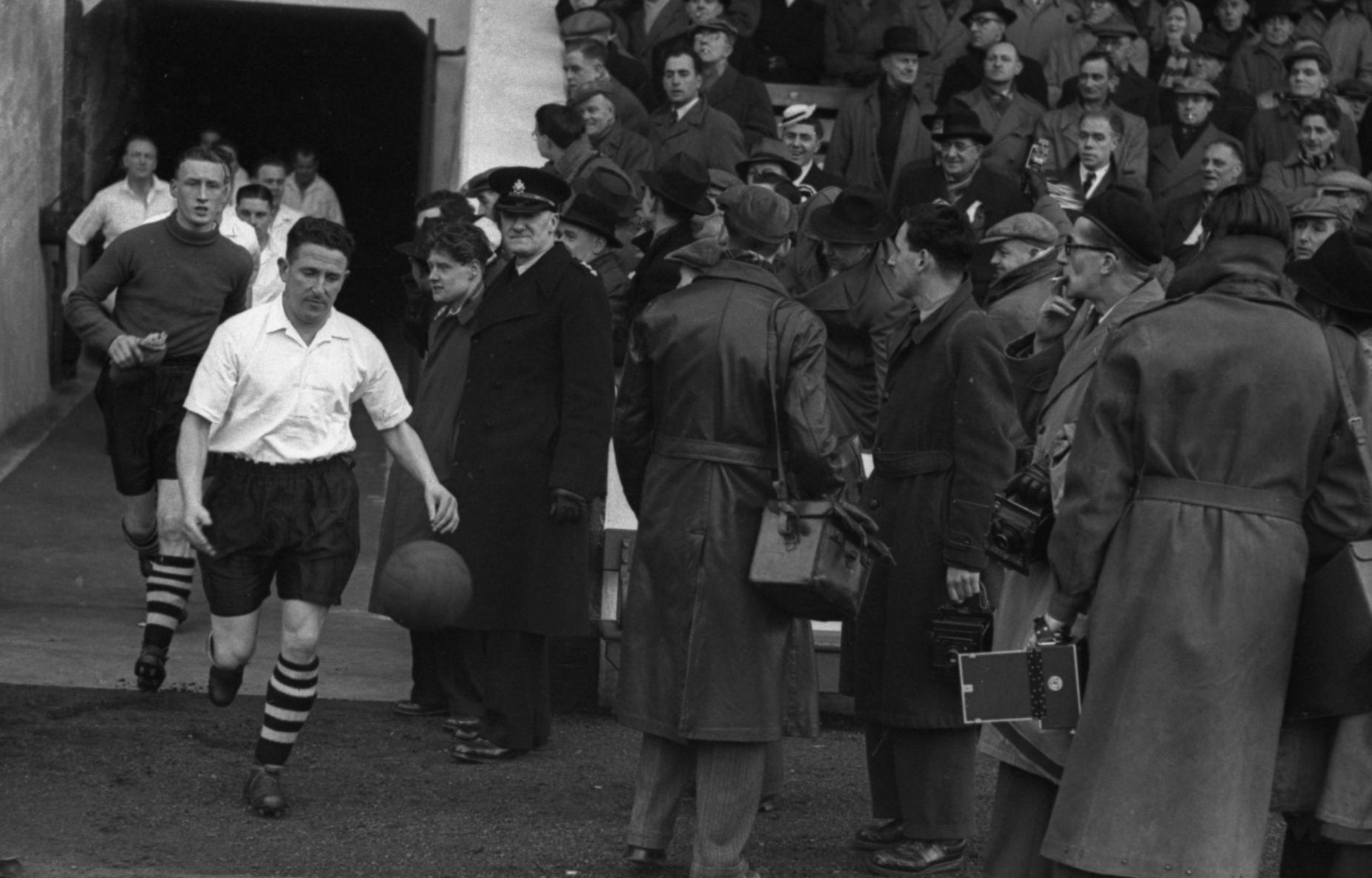 Bud Aherne leads the team out